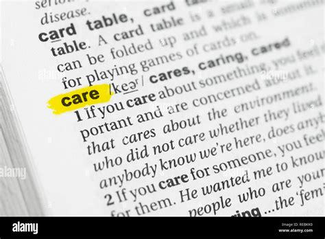 Highlighted English Word Care And Its Definition At The Dictionary Stock Photo Alamy