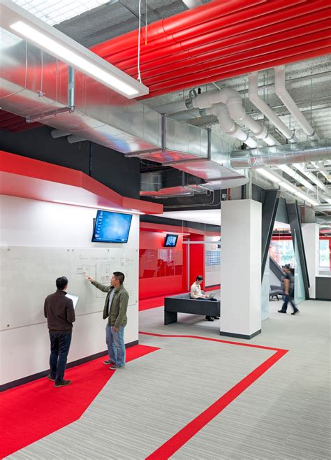 Design Blitz Finishes Comcast Office In Red