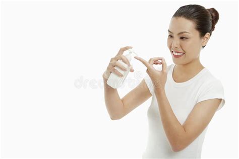 Woman Squirting Lotion Onto Her Finger Stock Image Image Of Lotion Moisturizer 185468863