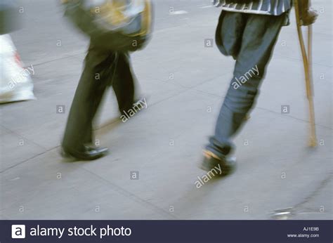 Amputee Walking With A Crutch Stock Photo Royalty Free Image 1187482