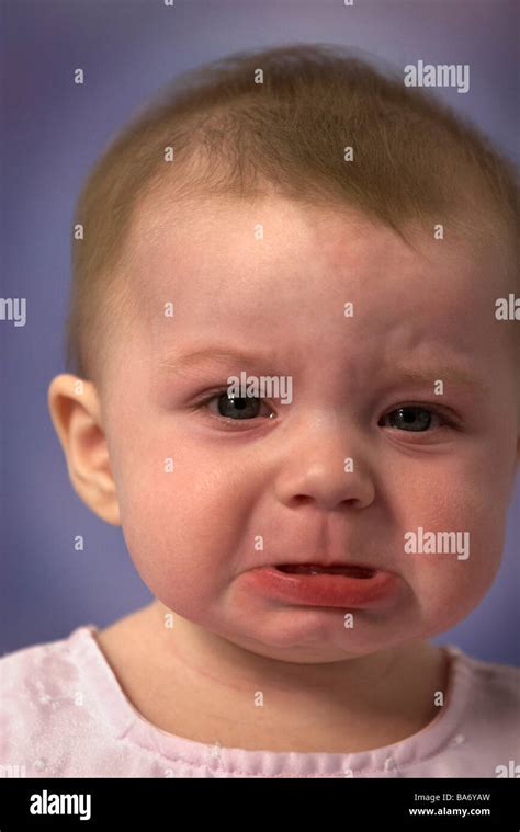 A Sad Baby Girl Pouting Stock Photo Alamy