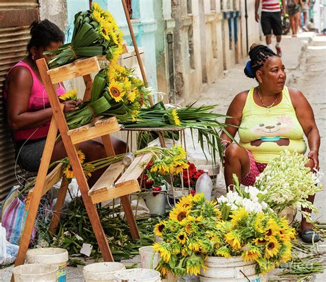 Two Women Selling Flowers On The Street In Havana Cuba Photograph By