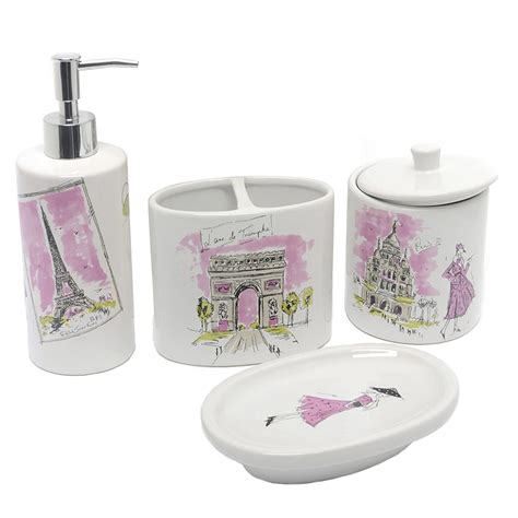 The bath accessory set is made of clear resin with a sparkle of the paris eiffel towel on the lotion pump and a. pink bathroom decor 2017 - Grasscloth Wallpaper