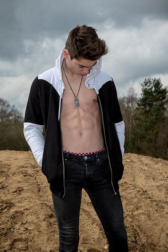 For tickling images (art or photographs) of boys under 12 being tickled. Teenage Boy Showing Off His Abs Stock Photo - Download ...