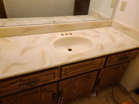 To breathe new life into an old wooden bathroom vanity and go from dated to contemporary, consider painting it instead of replacing it. Bathroom Vanity Resurfacing | Renew Resurfacing