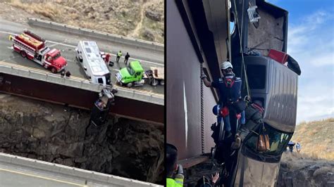 2 People Rescued From Pickup Truck Dangling Over Bridge Youtube