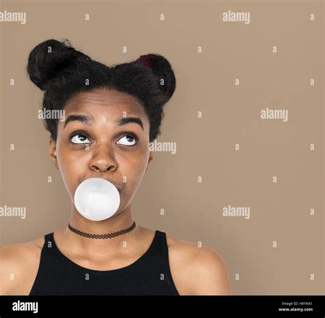 African Woman Blowing Bubble Gum Playful Portrait Stock Photo Alamy