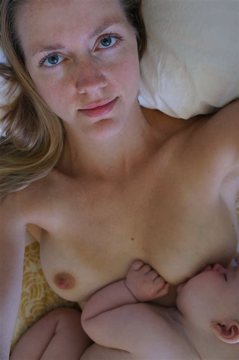 Mother Nude And Breastfeeding