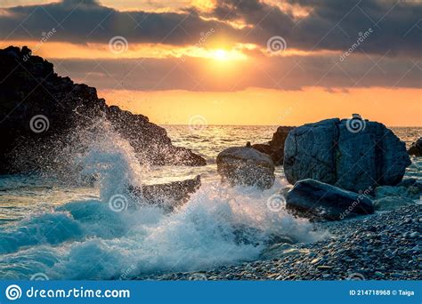 Sea Waves Splash Up To The Sky With Sun Sunset At Sea Storm Seascape