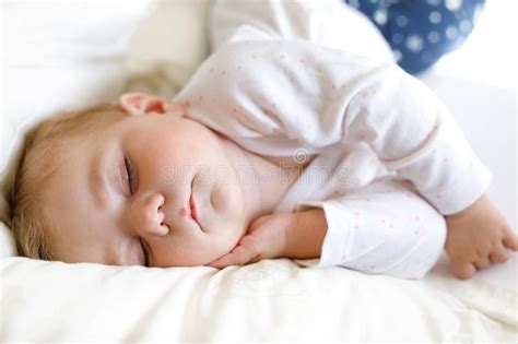 Cute Adorable Baby Girl Of Months Sleeping Peaceful In Bed Stock Photo Image Of Adorable