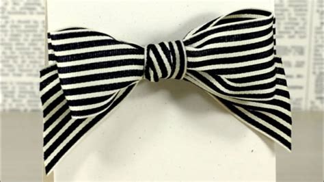 4th, wrap the ribbon into 8 shape; Tying A Bow With Wide Ribbon - YouTube