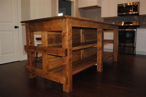 Large Rustic Wooden Kitchen Island With Open Shelves For Easy Access