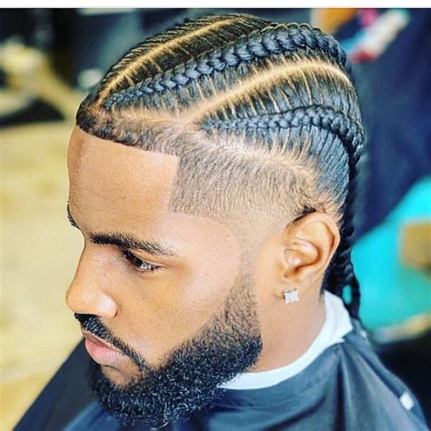 For a unique look, get a braided man bun the next time you visit a among all the cornrow variations, the cornrow man bun is the ultimate champion. The #NipseyHussle tributes are beautiful 😍 @hairjordan_310 ...