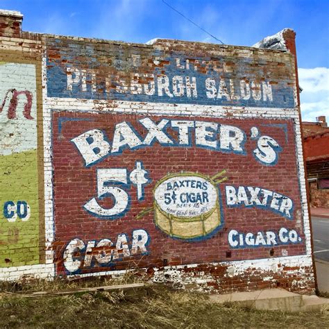 100 Year Old Advertising Signage Painted On The Side On A Late 1800s