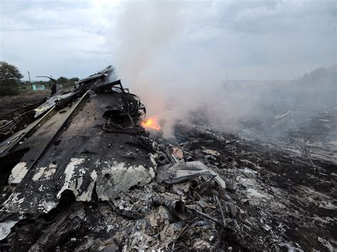 Speaking at the courtroom at. MH17 video: New footage from the aftermath of the crash released - 'There are bodies all over ...