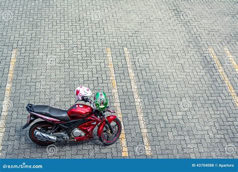 Red Motorcycle On Empty Car Parking Pavement Stock Photo Image Of