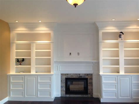 Designer nick olsen gives classic items—like the persian rug, chestnut bookcase, mini topiary on the mantle,. Gas Fireplace Surrounds with Bookcases | Built in shelves ...