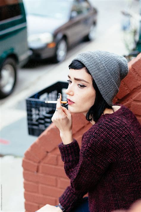 Woman Smoking A Cigarette By Stocksy Contributor Vero Stocksy