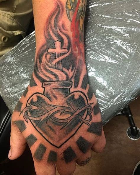 Sacred Heart Tattoo By Scott Sacred Heart Tattoos Hand Tattoos For