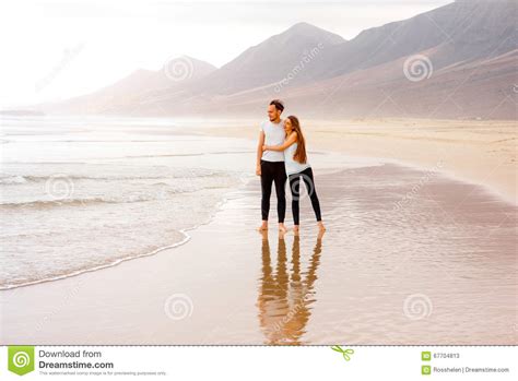 Couple Standing On The Beautiful Beach Stock Image Image Of Haze