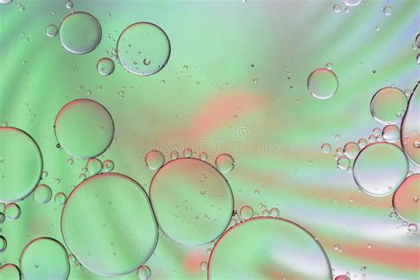 Colorful Artistic Of Oil Drop Floating On The Water Abstract Bubble Background Stock Image