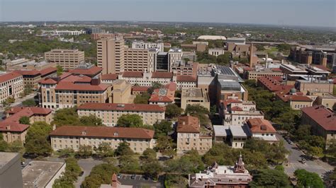 57k Stock Footage Aerial Video Of Slowly Passing Campus Buildings At The University Of Texas