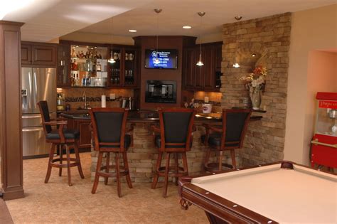 Cincinnati basement remodeling pros is the top basement remodeling company in the cincinnati ohio area. Basement With Bar, Theatre and Workout Room - Traditional ...