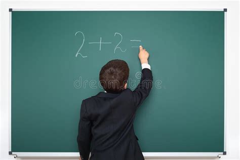 What does educational background mean? School Boy Decides Examples Math On Chalkboard Background ...