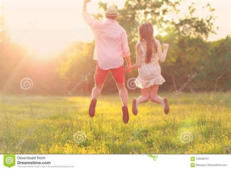 Young Couple In Love Having Fun And Enjoying The Beautiful Nature Stock
