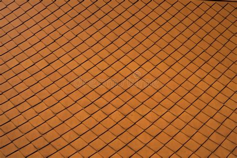Natural Orange Roof Tiles On A Building As A Texture Stock Photo