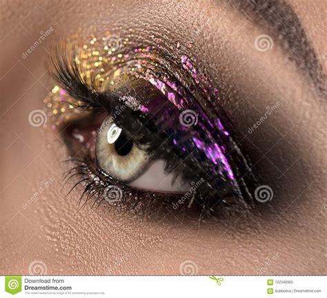 Beautiful Eye Makeup with Colorful Sparks. Beauty Bright Fashion