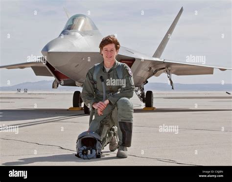 Us Air Force Pilot Col Dawn Dunlop Poses In Front Of Her F 22 Raptor
