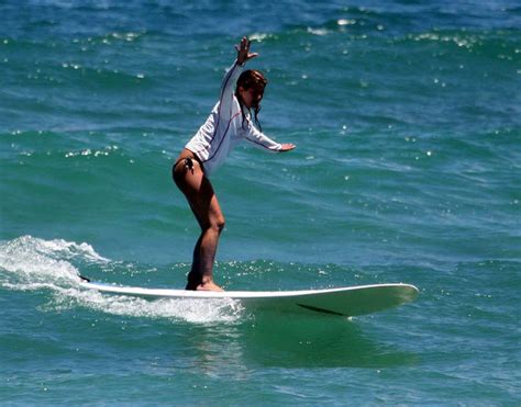 Jennifer Aniston Surfing