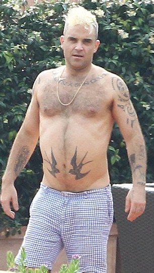 Robbie Williams Re Wears Famous Rock Dj Tiger Printed Pants Robbie