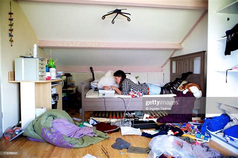 Teenager Making Homework In A Very Messy Room Photo Getty Images