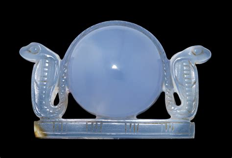 An Egyptian Blue Chalcedony Horus Behdet Amulet Late Period To Ptolemaic Period Circa 664 30 B