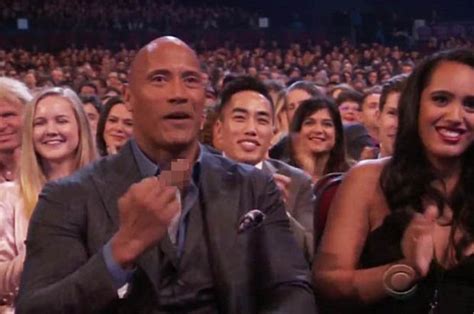 The Rock Gives Kevin Hart The Finger At Peoples Choice Awards Dwayne