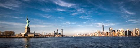 Panoramic View Of New York City And The Statue Of Liberty Stock Photo