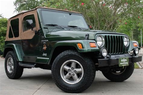 Convenience features passenger door bin front 1998 jeep wrangler sport clean carfax. Used 1998 Jeep Wrangler Sahara For Sale ($16,995) | Select ...