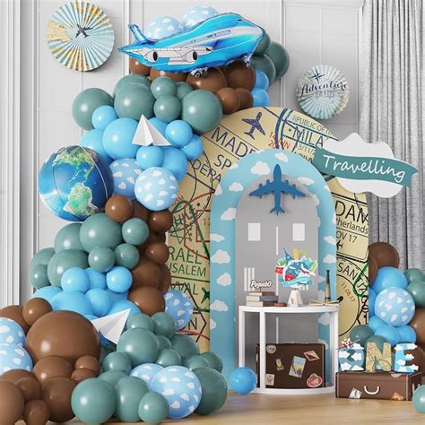 An Airplane Themed Birthday Party With Balloons And Decorations