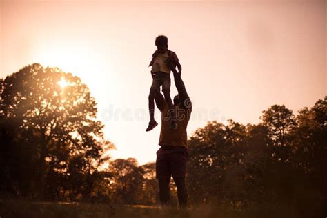 African American Father And Son Silhouette