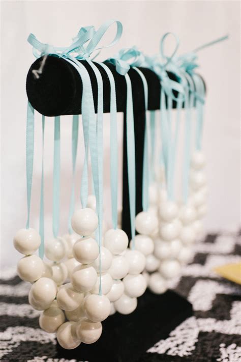 In addition to an array of pretty baked goods topped with baubles and white tiffany bows, party guests were for my daughter savannah's 6th birthday party we went with a breakfast at tiffany's theme, complete with a audrey hepburn inspired photo. Party Reveal: Breakfast at Tiffany's Party
