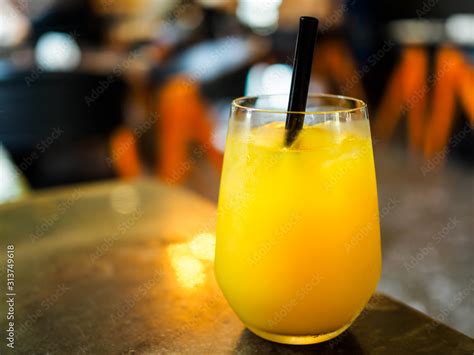 Glass Of Orange Juice Fruit Juice In A Bar Restaurant Setting With
