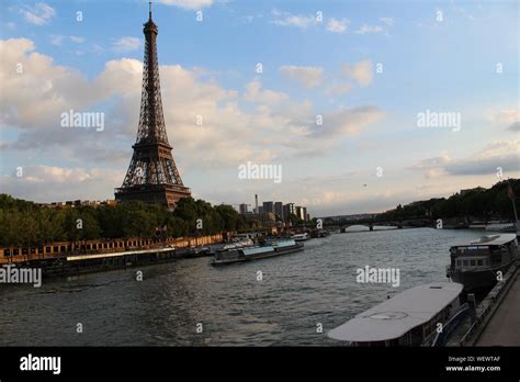 Eiffel Tower By Seine River Stock Photo Alamy