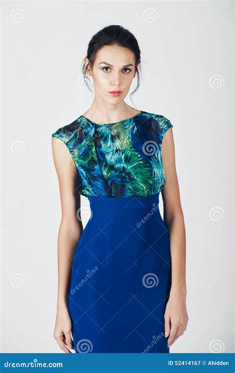Fashion Photo Of Young Magnificent Woman In A Blue Dress Stock Image