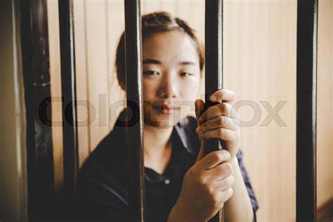 Beautiful Young Girl Behind The Bars Stock Image Colourbox