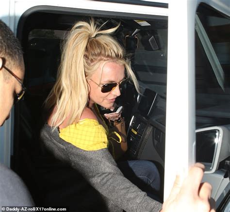 Britney Spears Flaunts Cleavage And Sunburn In Revealing Top During