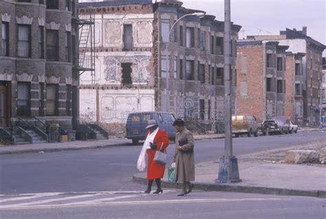 Two Women Crossing Street In Ghetto South Bronx New York Editorial