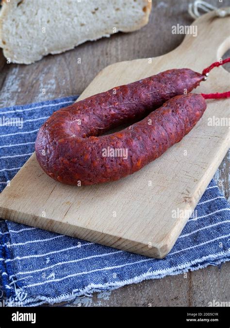 Spanish Chorizo Sausage On Rustic Background Stock Photo Alamy