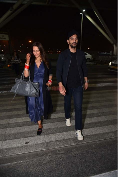 Newly Married Couple Neha Dhupia And Angad Bedi Spotted At Airport Photos Filmibeat